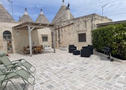 External spaces Trulli Sole